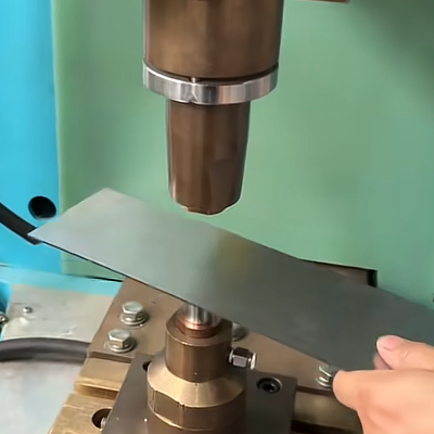 Energy storage spot welding machine for welding stainless steel plates with stainless steel convex ring nuts